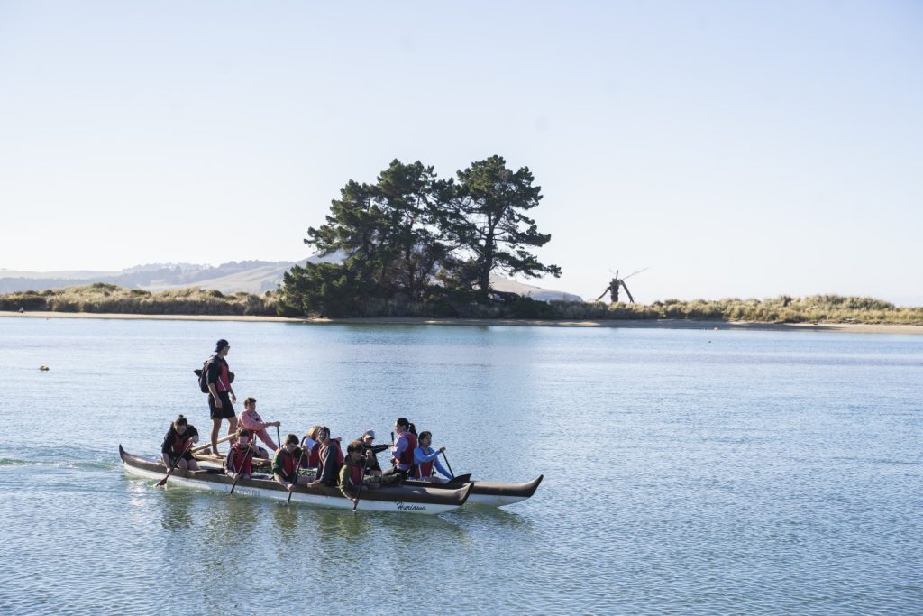 Learning to paddle a waka with Karitane Maori Tours Dunedin